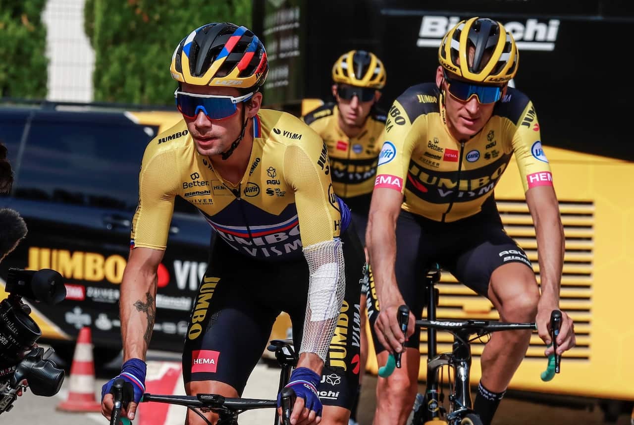 Slovenian rider Primoz Roglic (L) of Team Jumbo-Visma and teammates ride during a training session one day ahead of the 107th edition of the Tour de France.
