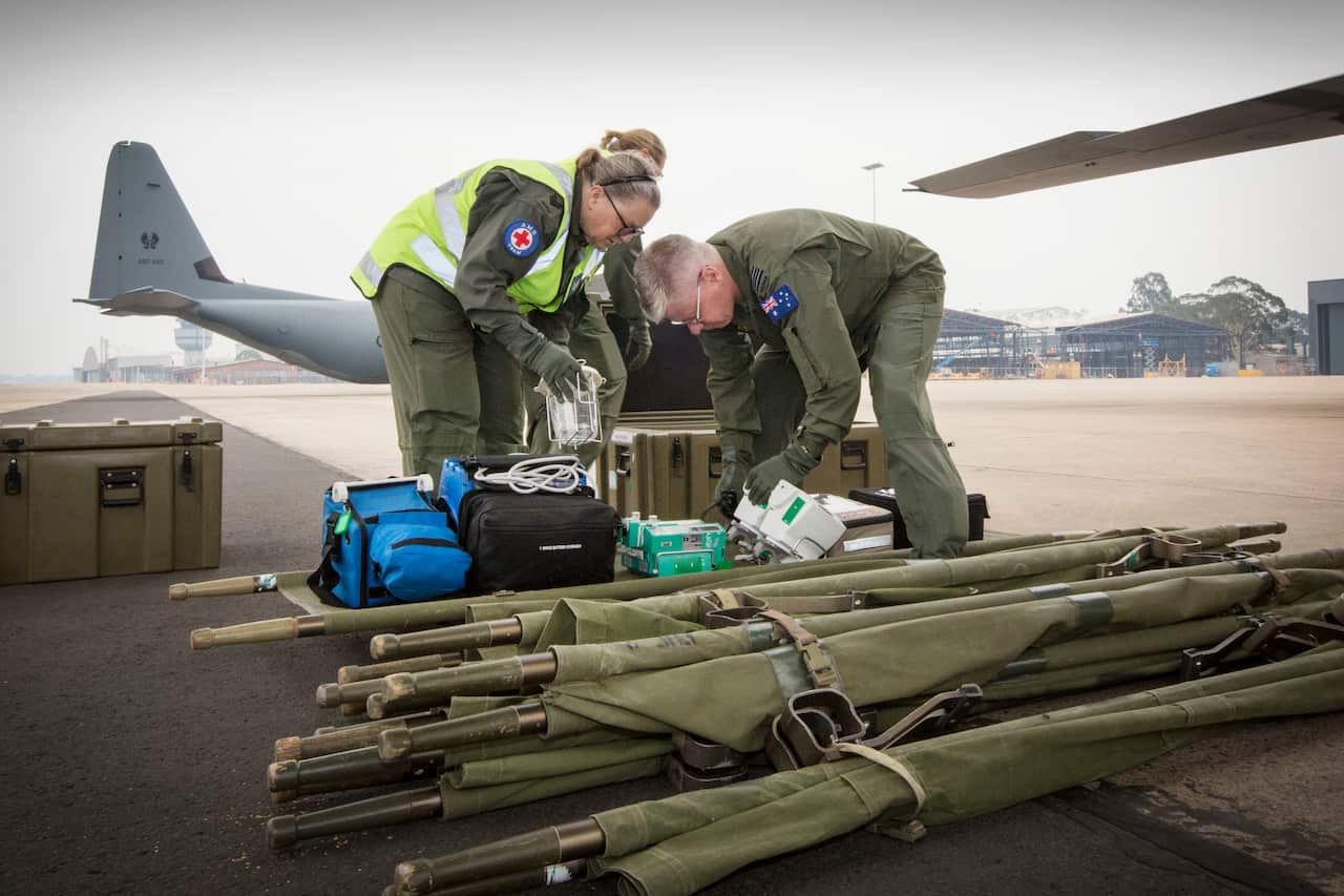 Medical equipment, including stretchers are loaded on board the a C-130J Hercules as part of the repatriation mission. 