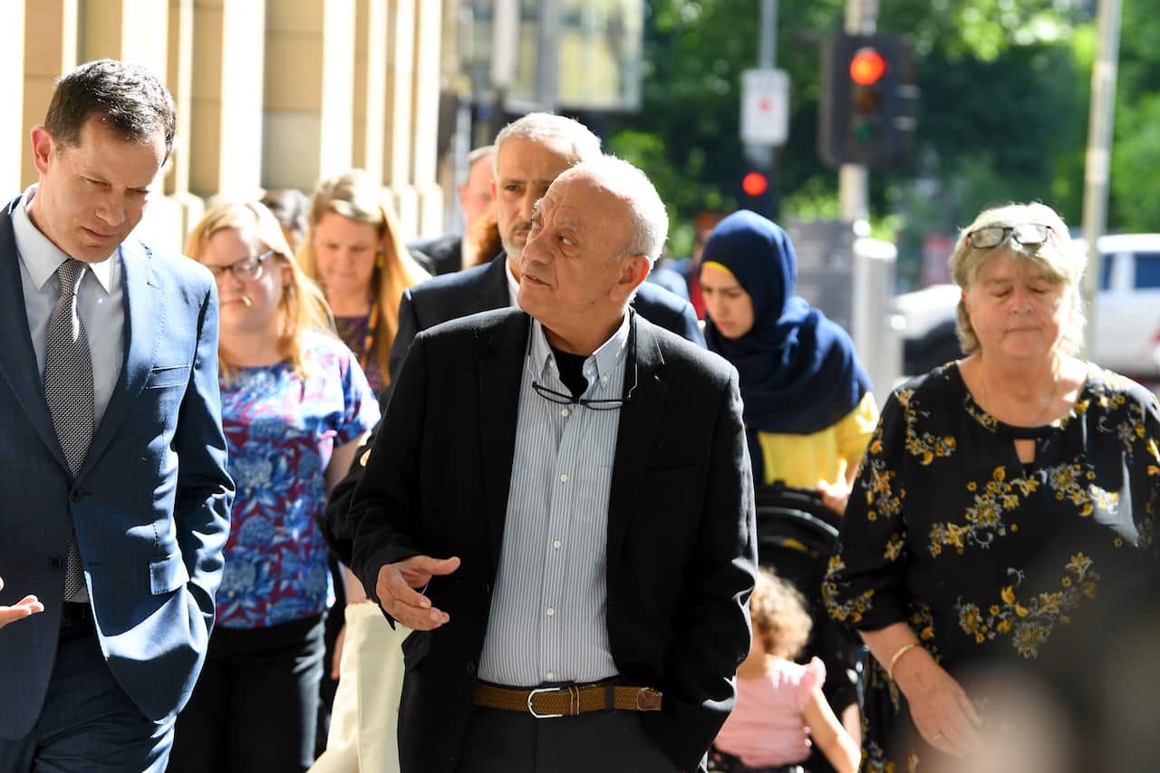 Saeed Maasarwe (centre), the father of murdered exchange student Aiia Maasarwe, arrives to the Supreme Court of Victoria in Melbourne.