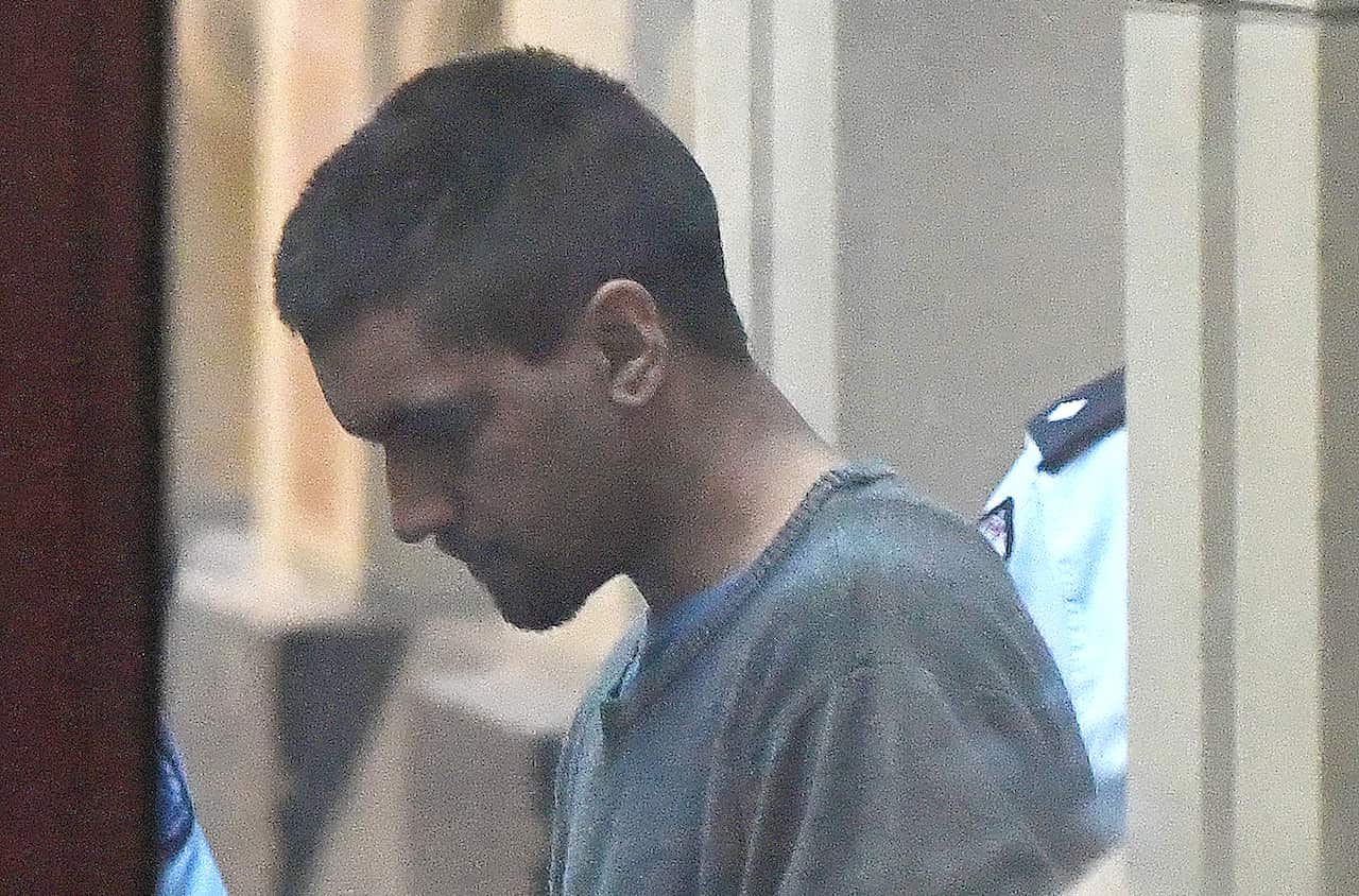 Codey Herrmann departs the Supreme Court of Victoria after being sentenced to 36 years in prison. 