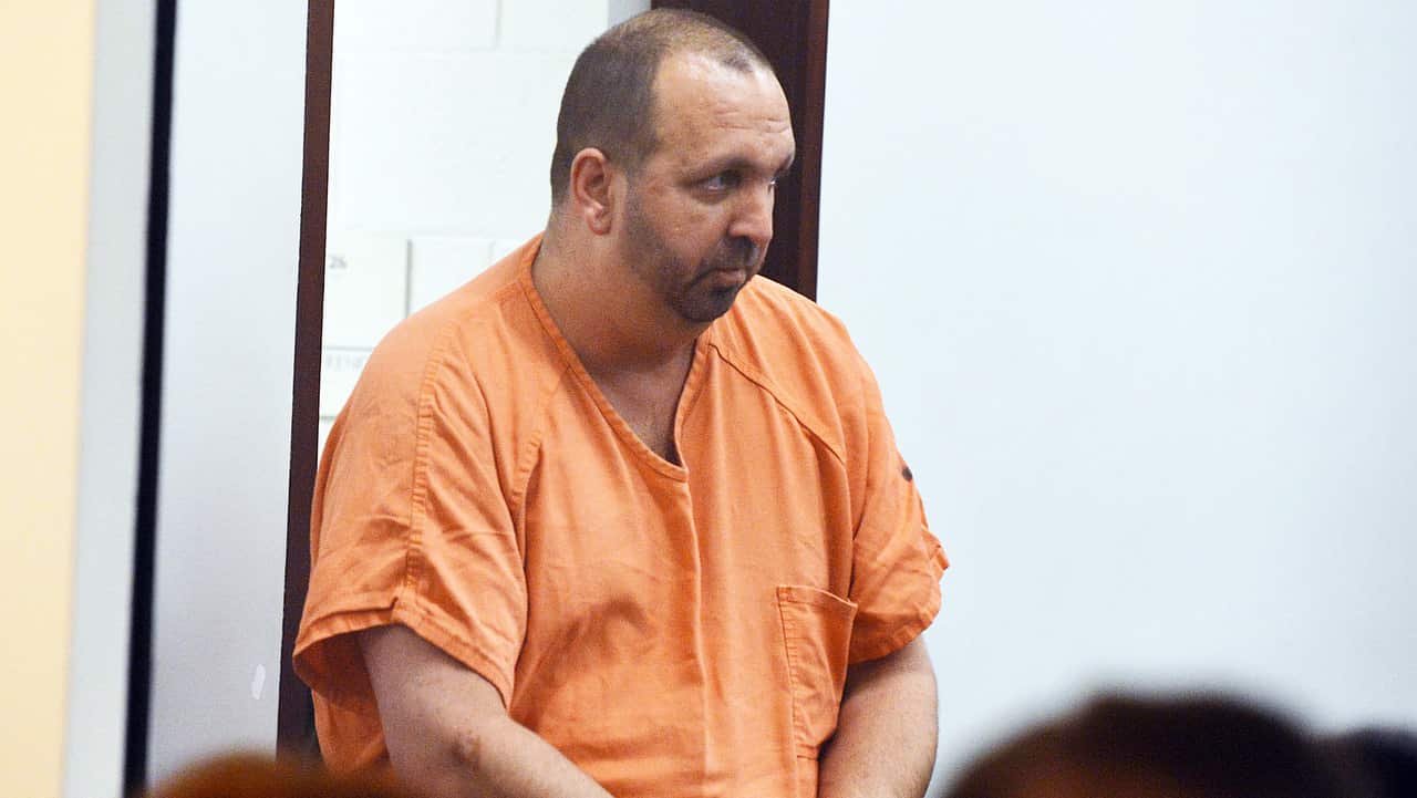 Craig Stephen Hicks on 11 February, 2015 enters the courtroom for his first appearance at the Durham County Detention Center, in Durham.