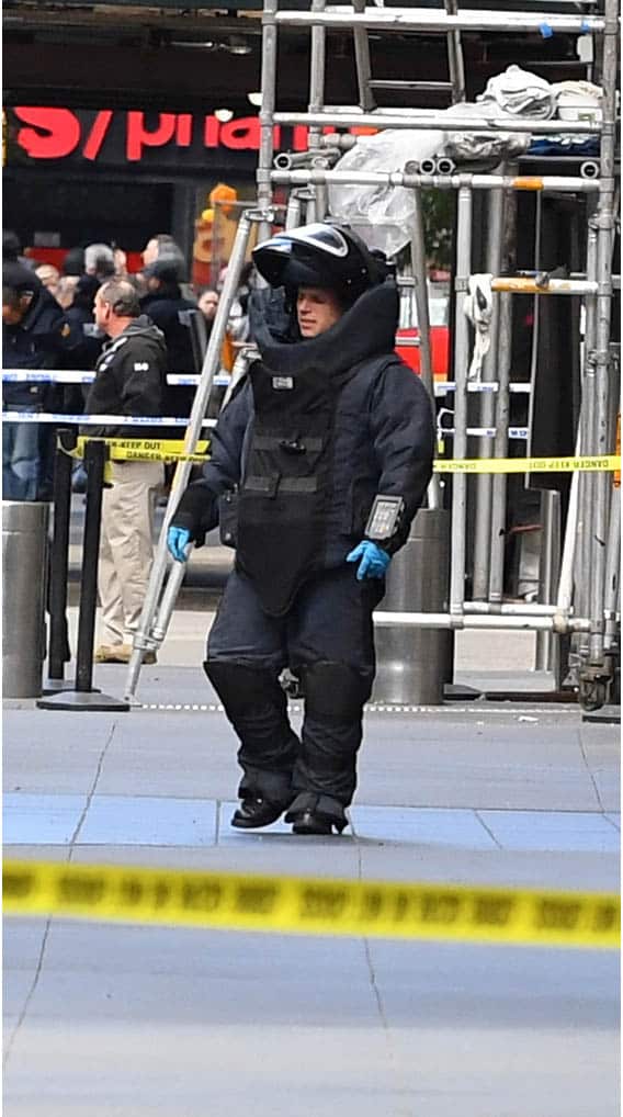 A Bomb Squad technician in a bomb suit outside CNN’s New York office.