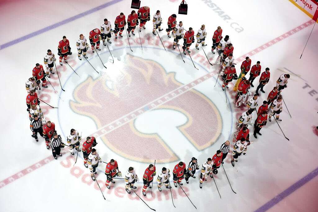 The Calgary Flames and the Vegas Golden Knights honour the victims of the Humboldt Broncos bus crash before an NHL game on April 7, 2018.