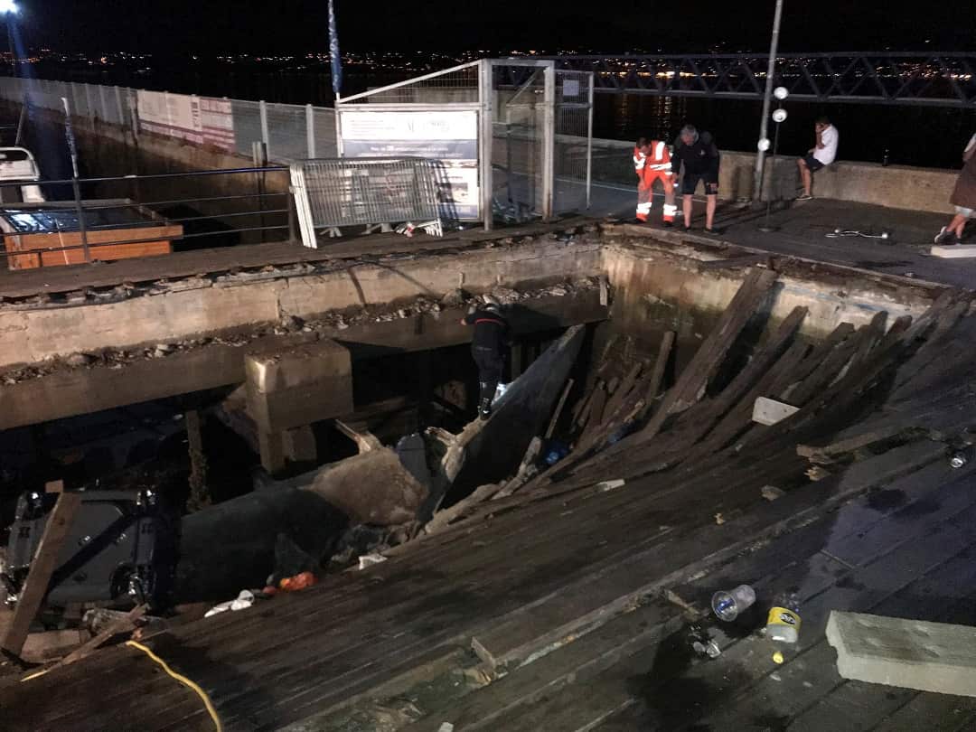The hole in the seafront platform that had been packed with festival goers. 