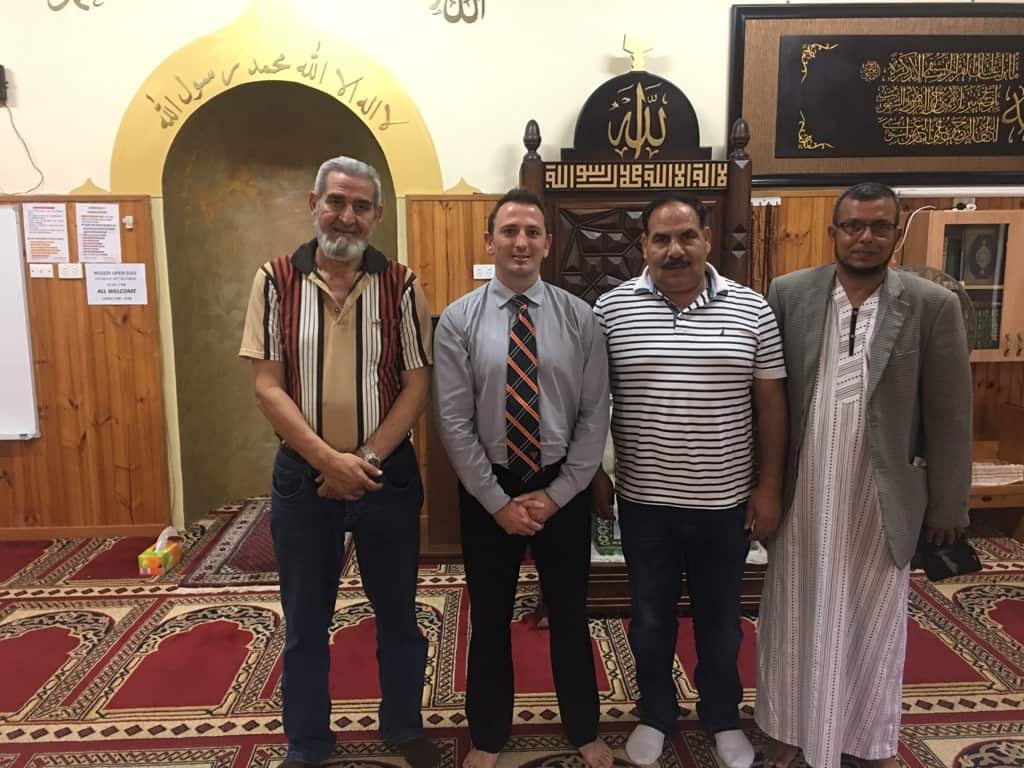 Shane Holley, second from left, at an earlier visit to Logan Mosque.