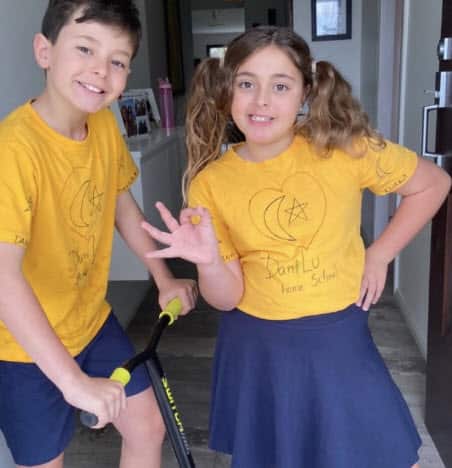 Danilo and Luana Franco's mother Alerissa made them homeschooling uniforms.