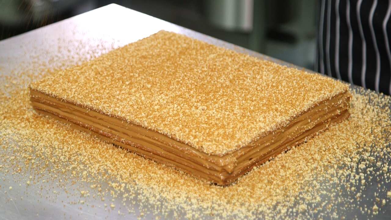 Honey cakes are makes with layers of cake, creamy caramel and crushed walnuts.