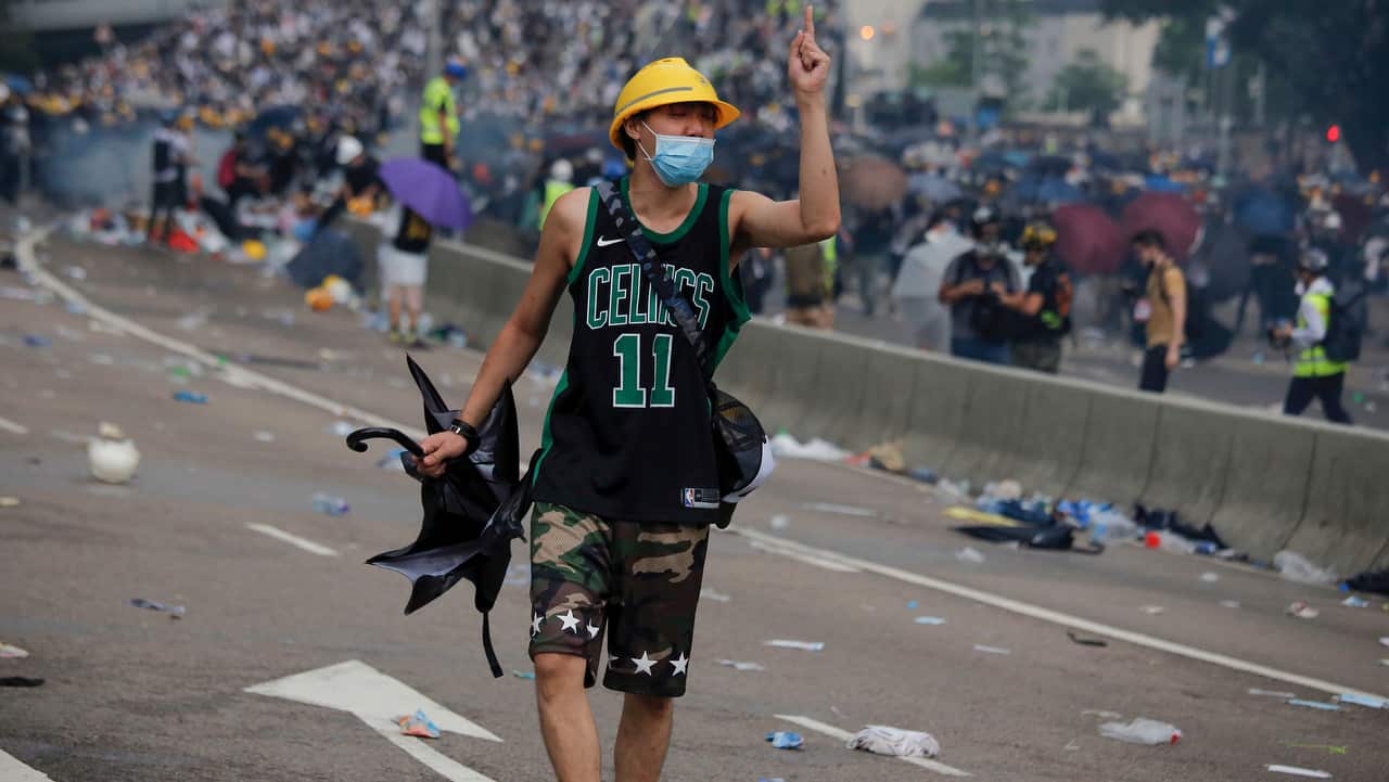 Hong Kong police fired tear gas and rubber bullets at protesters who had massed outside government headquarters on Wednesday.