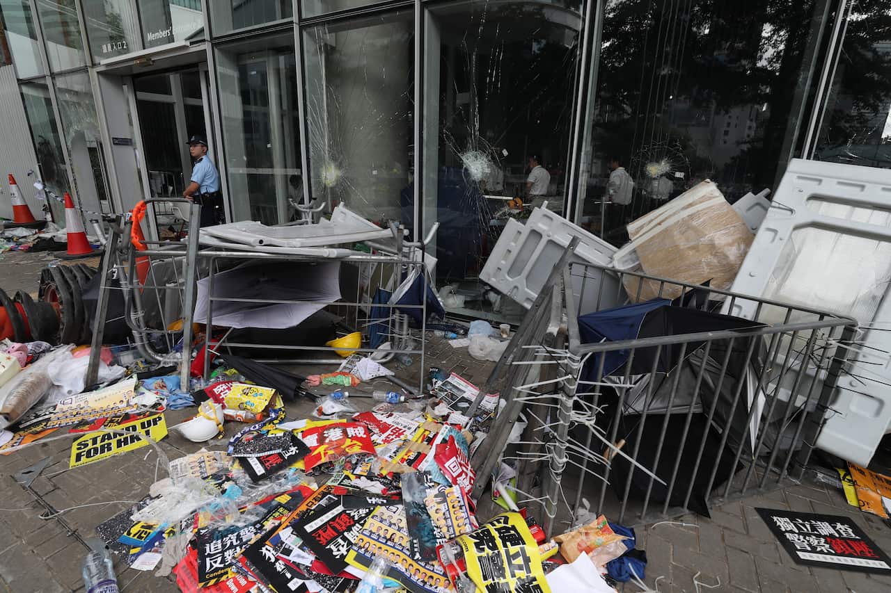 Placards and abandoned items used for a barricade at the Legislative Council Building after protesters stormed the building in Hong Kong