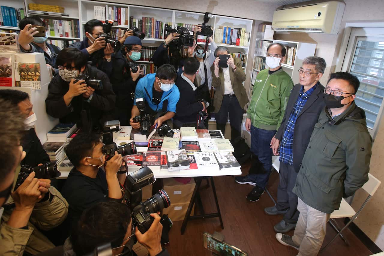 Journalists gather at the new Causeway Bay Book shop on the opening day in Taipei, Taiwan. 