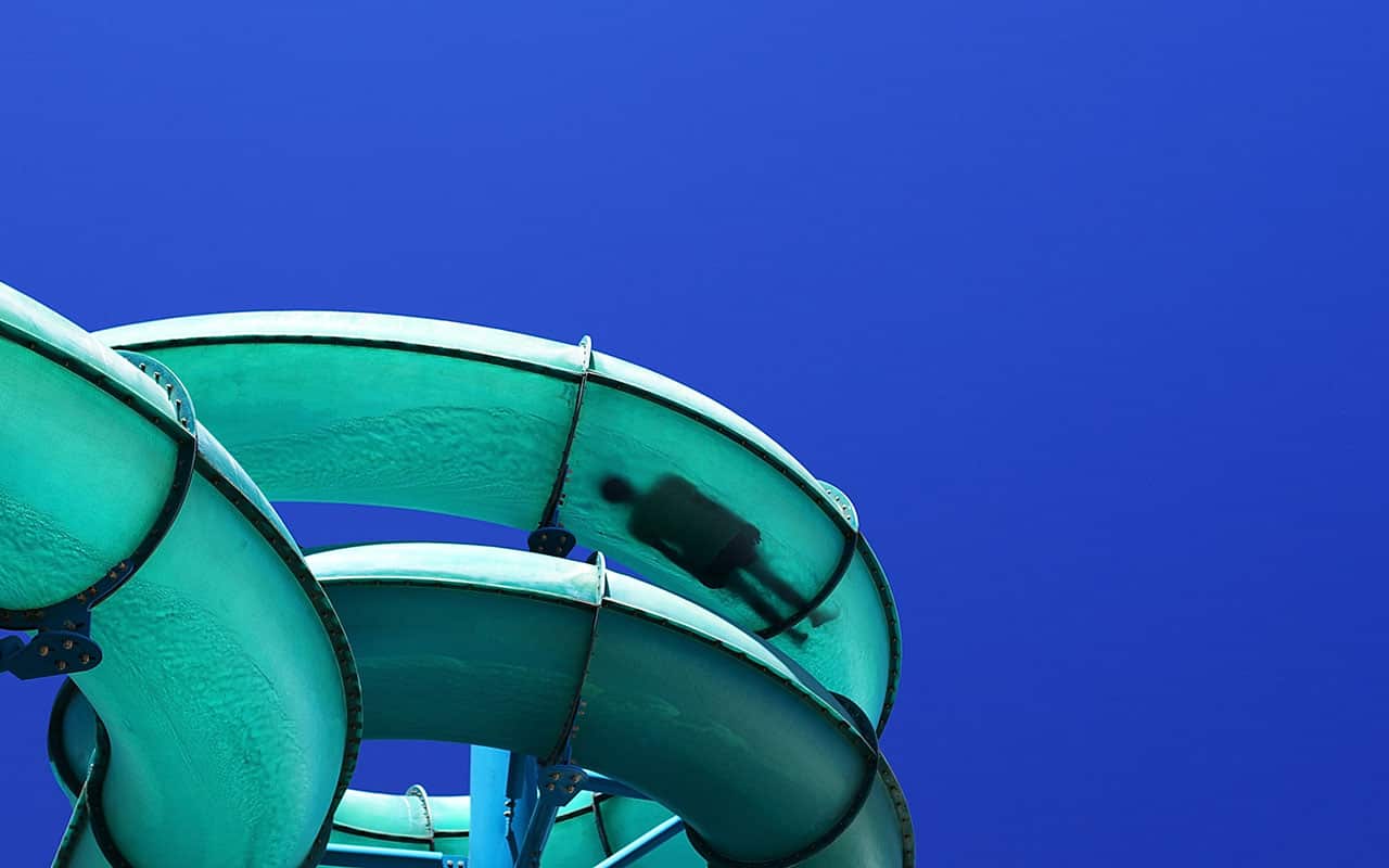 A teenager cools off on a waterslide during a heat wave at Glenelg on January 13, 2014 in Adelaide, Australia.