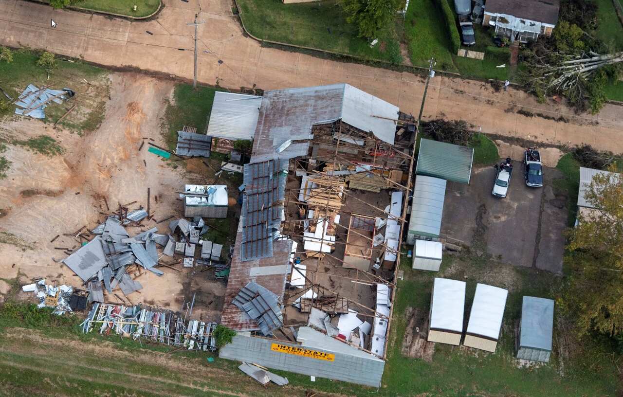 Damage to a roof from Hurricane Laura is seen Friday, Aug. 28, 2020, in Pineville, Louisiana.