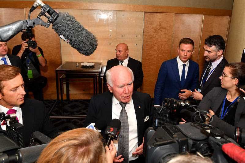 Former Australian Prime Minister John Howard speaks to the media on arrival at the count at the Federal Liberal Reception at the Sofitel-Wentworth hotel.