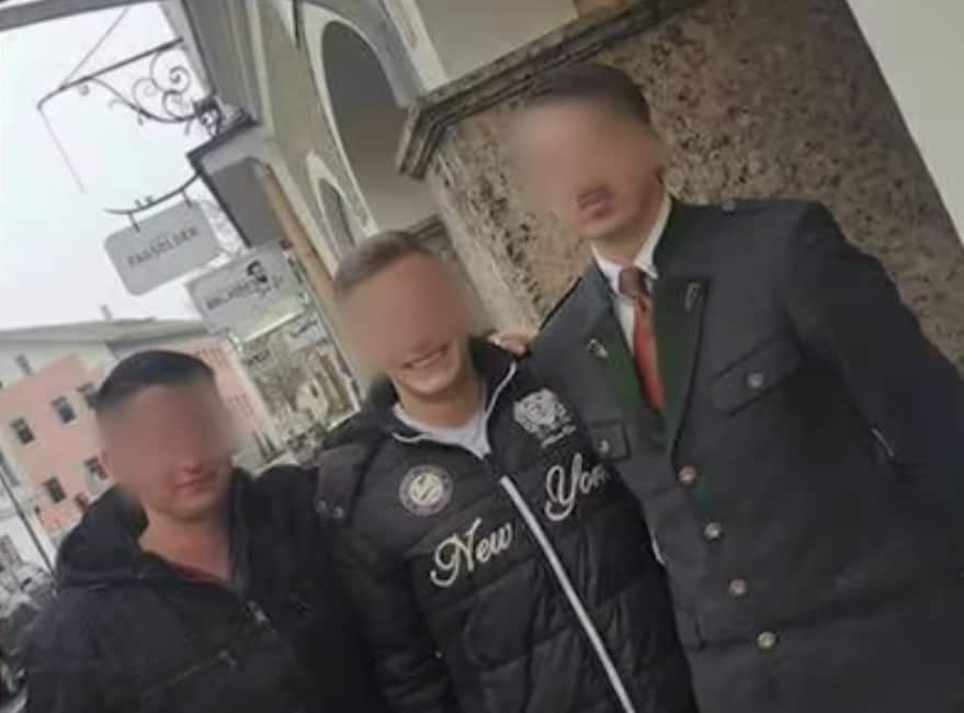 The man on the right with locals on the town (Servus TV)