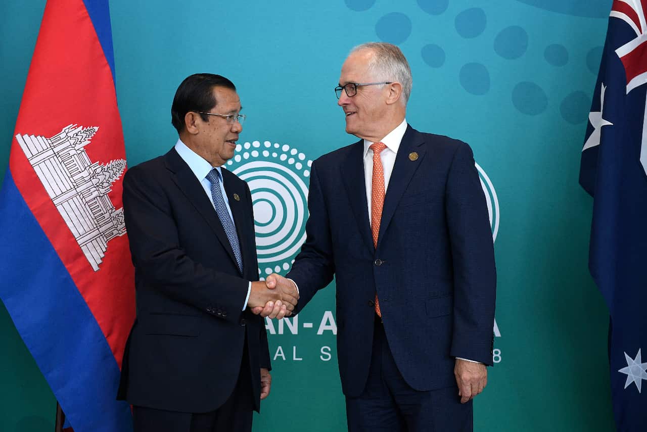 Cambodian Prime Minister Hun Sen shakes hands with Prime Minister Malcolm Turnbull at the ASEAN summit on Friday. 