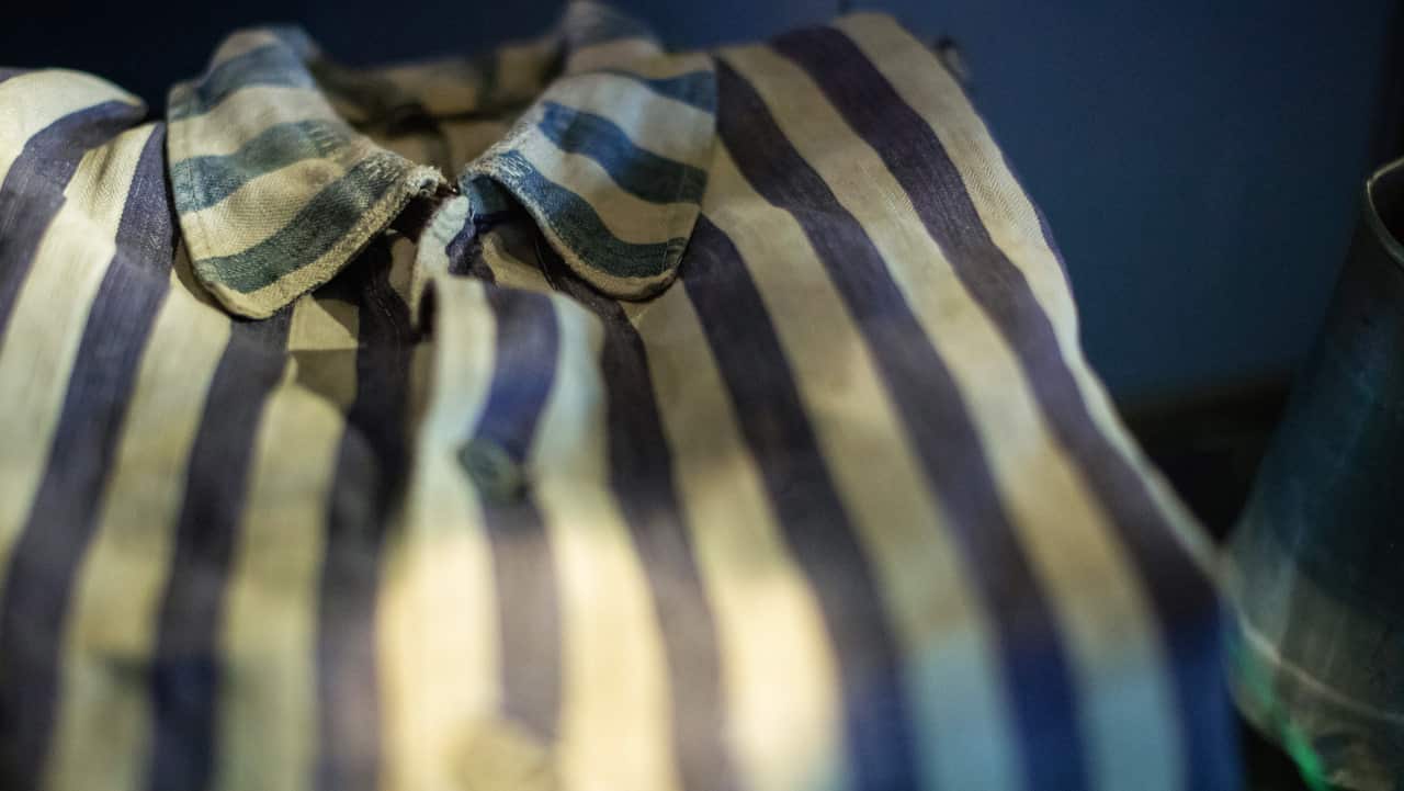 A prisoner uniform is on display in the Holocaust Memorial Center.
