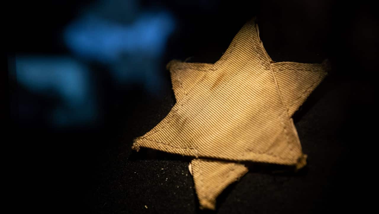 A yellow star sewn from fabric is on display in the Holocaust Memorial Center in Budapest.