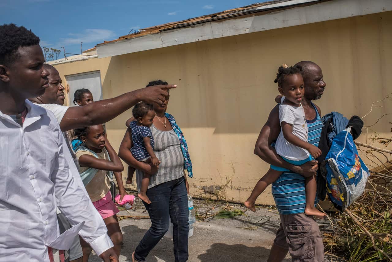 People awaiting evacuation in Treasure Cay.