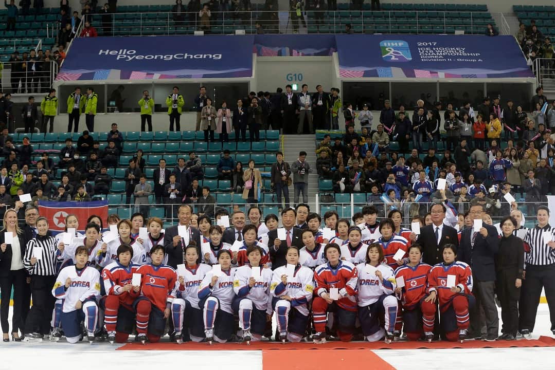 April 6, 2017: Women's ice hockey players from South Korea, white, and North Korea, red, at the   Ice Hockey Women's World Championship.