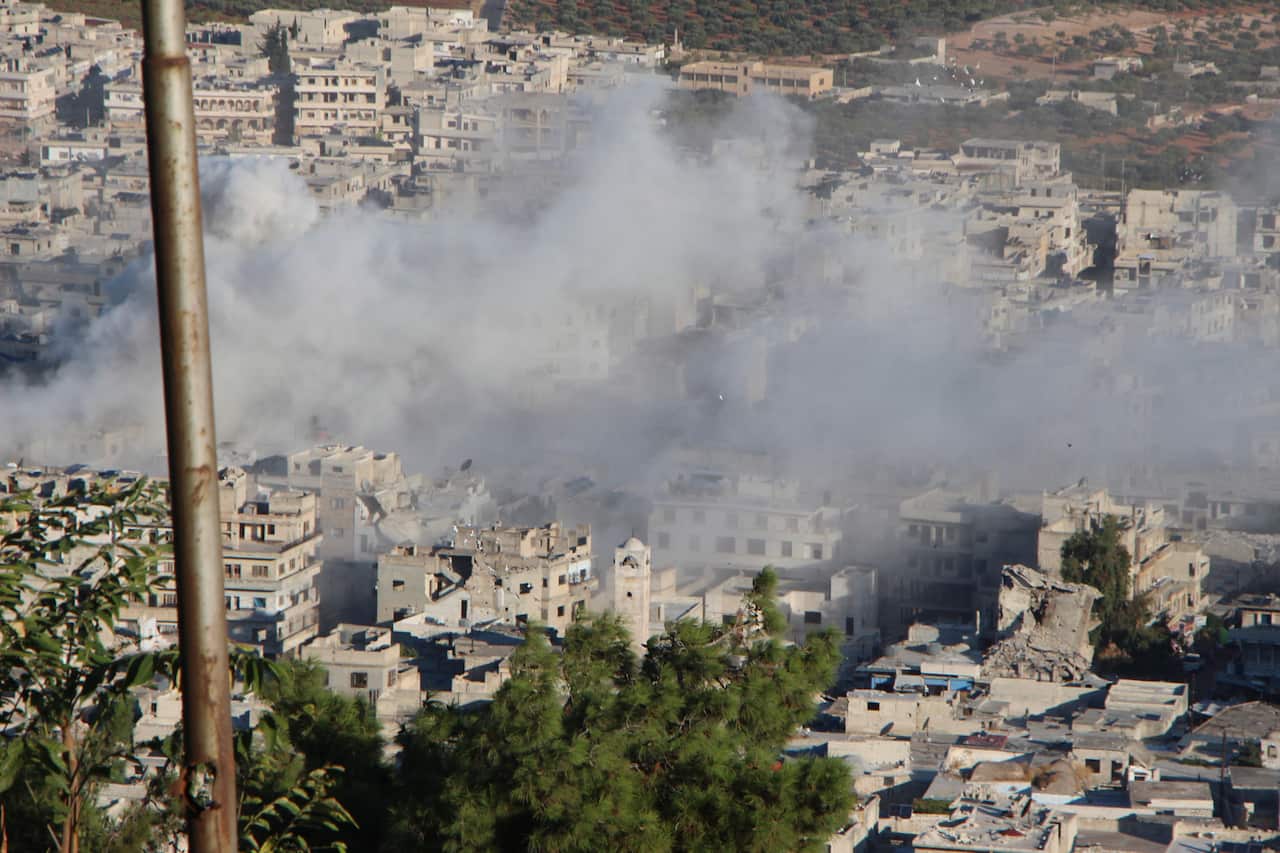 Smoke rising above the northern town of Ariha, in Idlib province, Syria, from government shelling on 20 October, 2021.