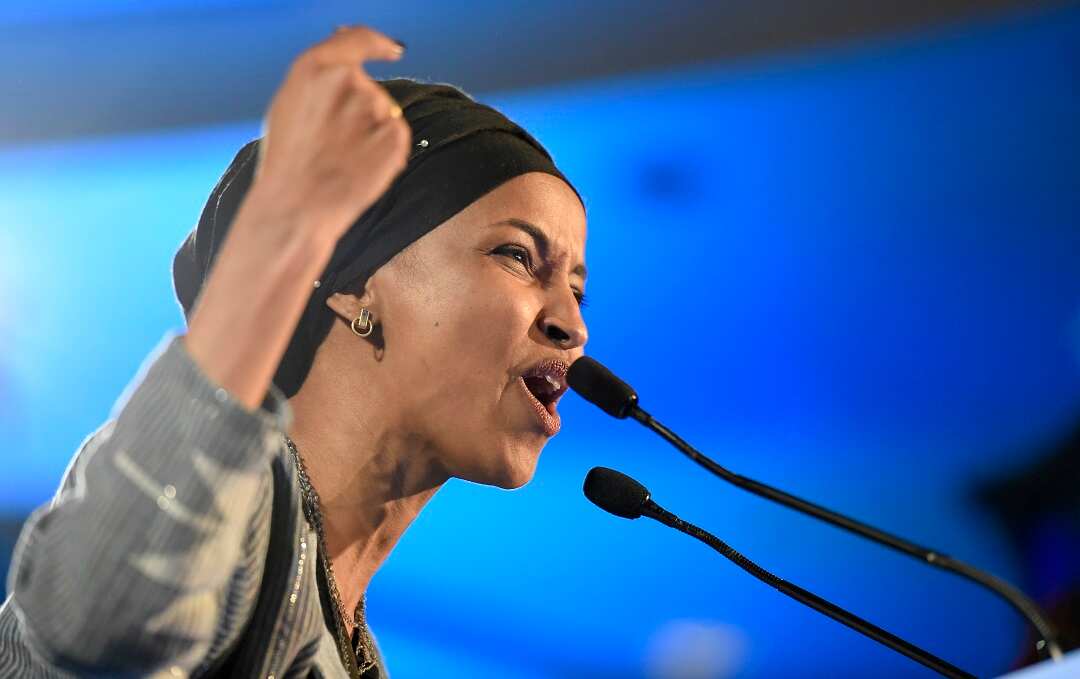 Democrat Ilhan Omar speaks after winning in Minnesota's 5th Congressional District race during the election night event held by the Democratic Party Tuesday, Nov. 6, 2018, in St. Paul, Minn. (AP Photo/Hannah Foslien)
