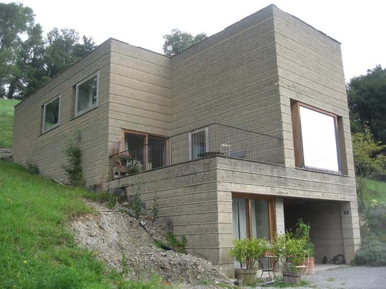A modern, unstabilised rammed earth house in Austria.