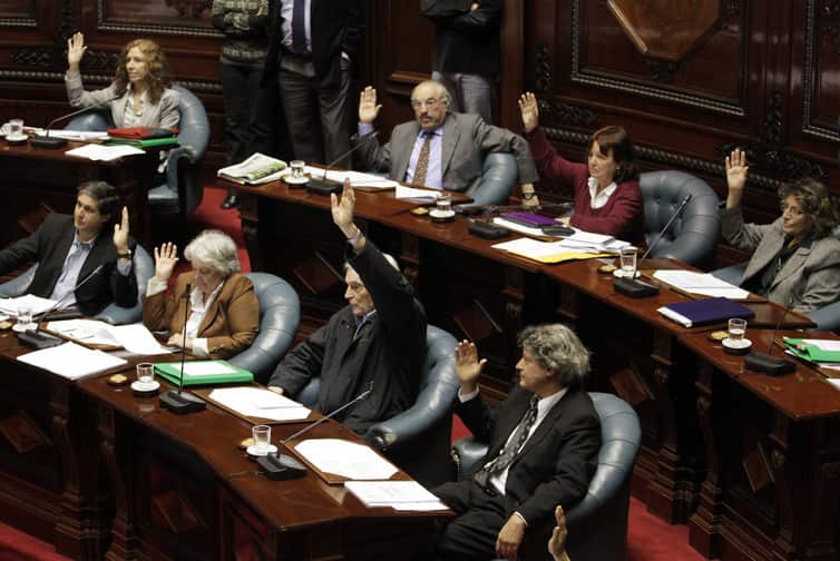 Uruguayan senators vote 17 to 14 in favor of a bill to legalize abortions during the first 12 weeks of pregnancy in Montevideo.