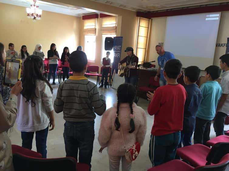 Creative workshop by US NGO Invest in Children for Syrian refugee and Turkish former street children at Hayat Foundation NGO, Istanbul, Turkey.