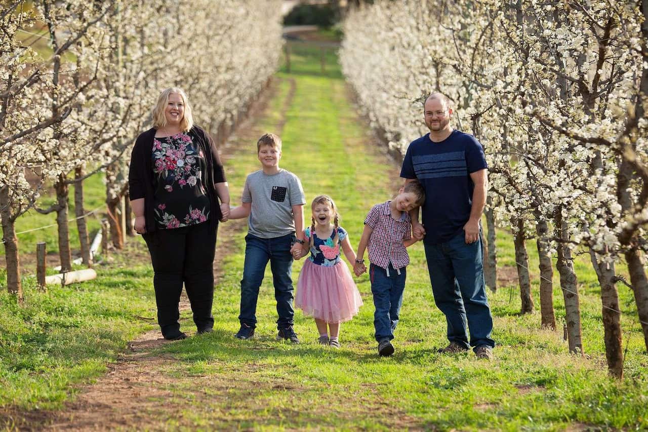 Lauren Oliver, pictured here with her family, said she wants to be able to care for her grandmother into her old age.