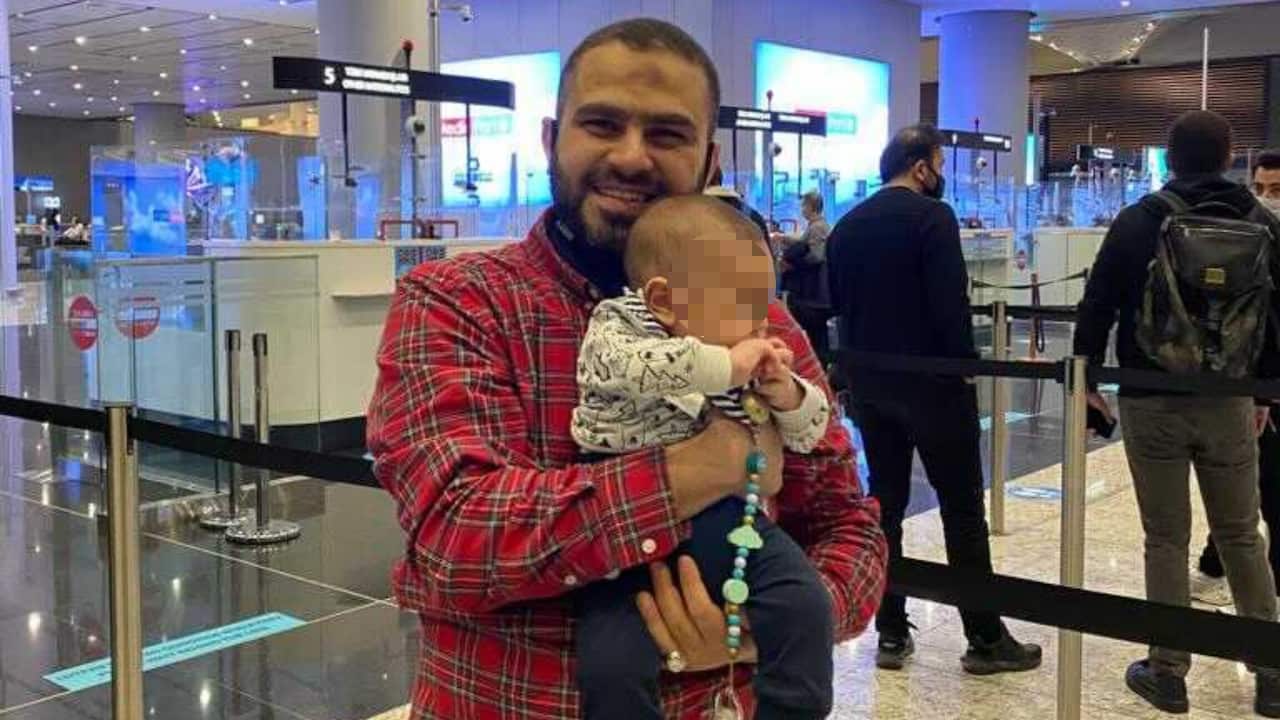 Osama Al-Hasani with his four-month-old child in Morocco, hours before he was detained. 
