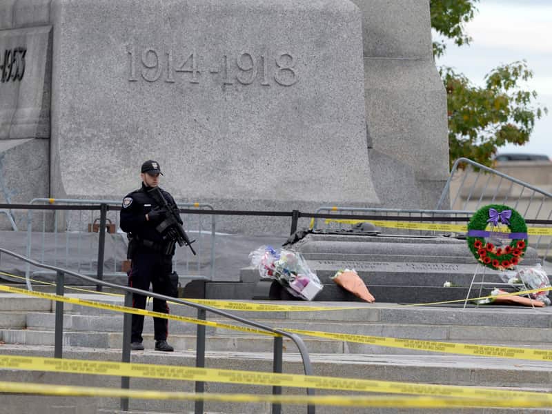 A police officer on guard outside the National War Memorial in Ottawa