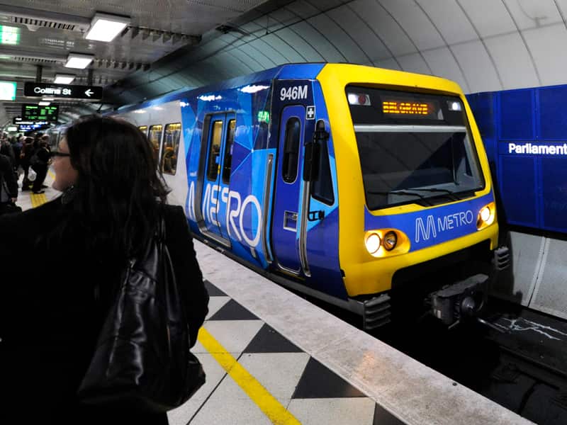 A Metro train approaches Parliament station