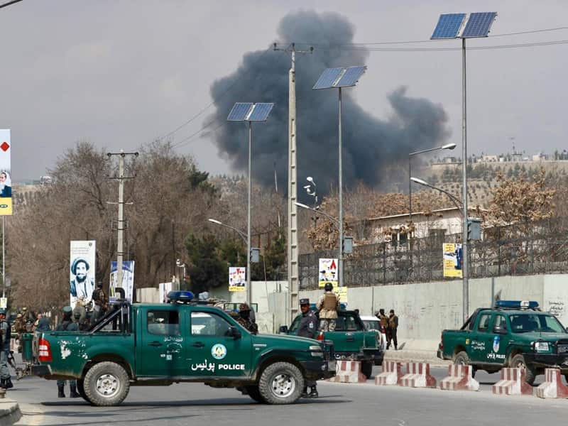 Security forces guard the area during an attack in Kabul