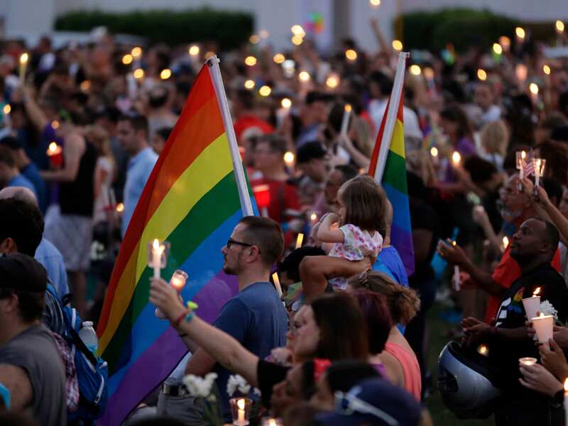 Supporters of the victims of the Orlando shooting attend a vigil
