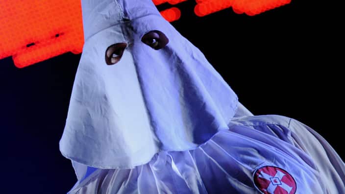 The small town editor is under fire after writing the re-introduction of the Ku Klux Klan would be a good thing for the country. 