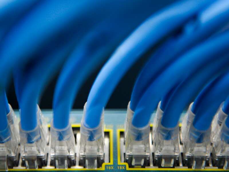 Ethernet cables are seen in a server room in Canberra