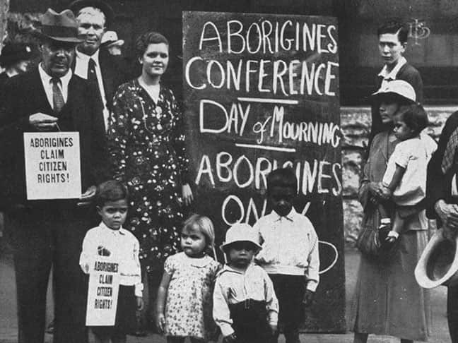 A black and white photo of Aboriginal people protesting 