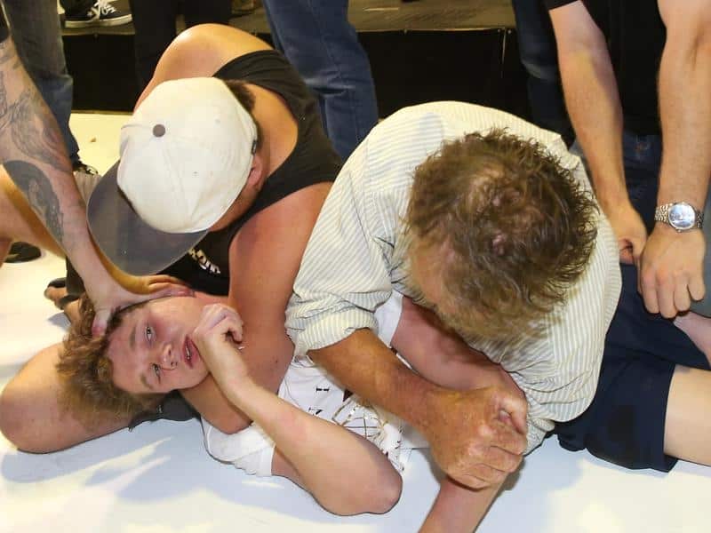 Will Connolly was restrained by Fraser Anning supporters after he egged the senator.