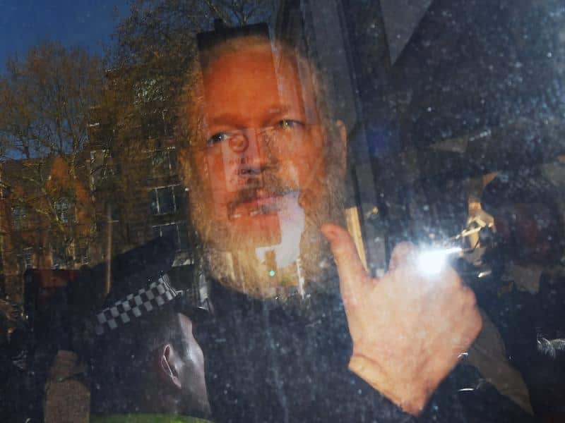 Julian Assange following his arrest.