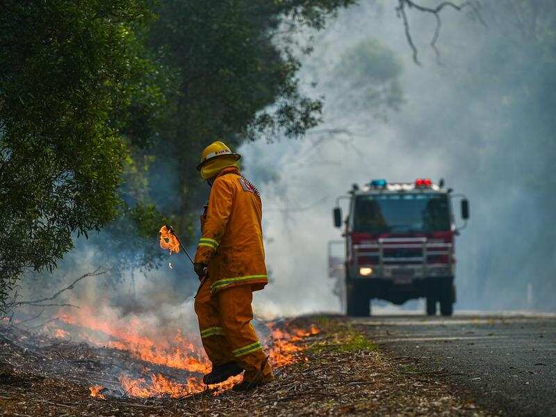 Firefighters at work near Corryong, Victoria, during the recent bushfires. 