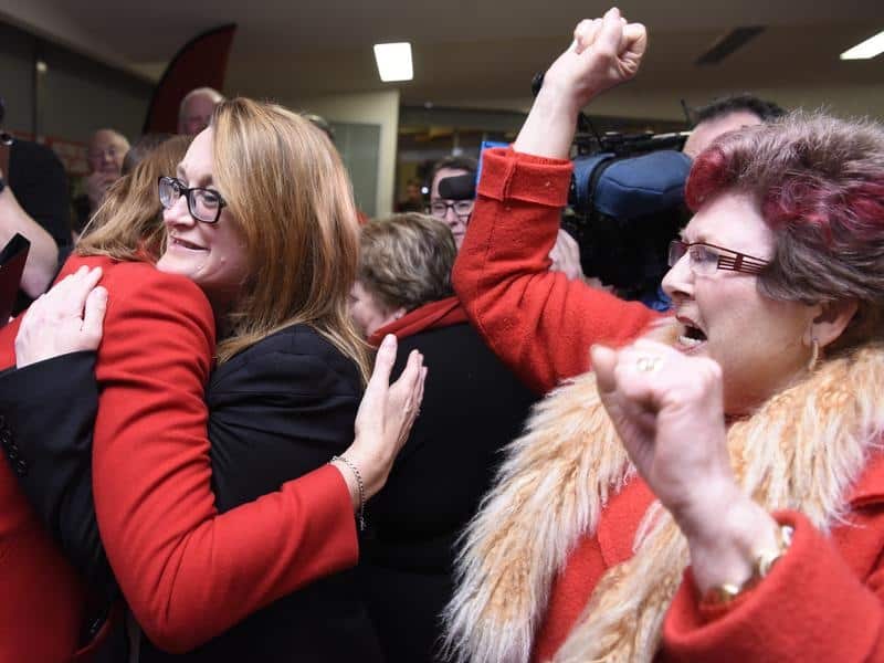 Justine Keay celebrates her by-election win with supporters.