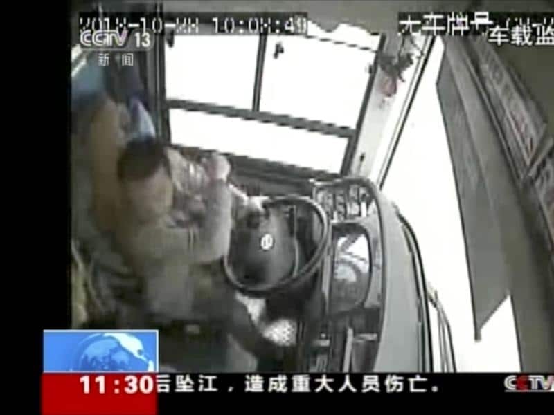 CCTV footage shows a bus driver hitting back at a passenger moments before the bus crash.  