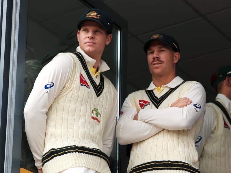 Steve Smith (left) and David Warner (right) have received year-long bans over the ball-tampering scandal.