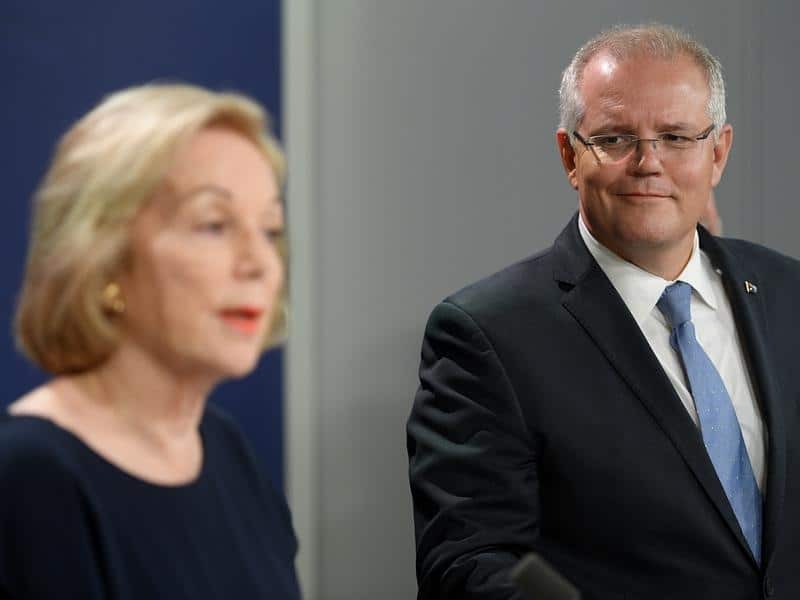 ABC Chair Ita Buttrose (L) and Prime Minister Scott Morrison are expected to meet soon. The ABC boss is now considering legal action. 