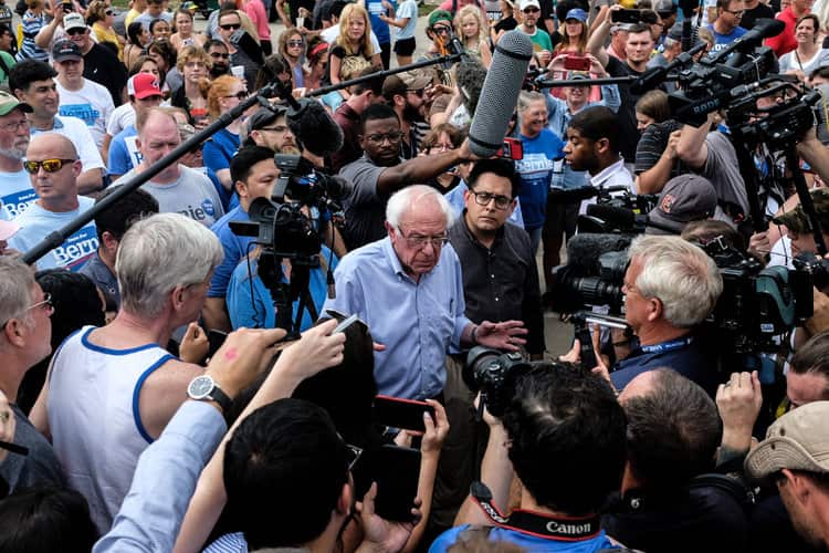 Senators Sanders speaks with the media on the campaign trail. 