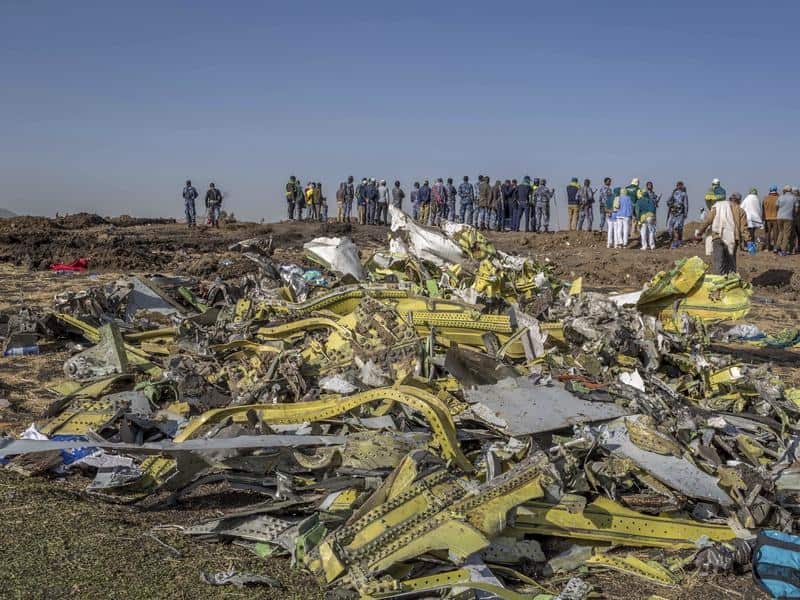 Wreckage is piled at the crash scene