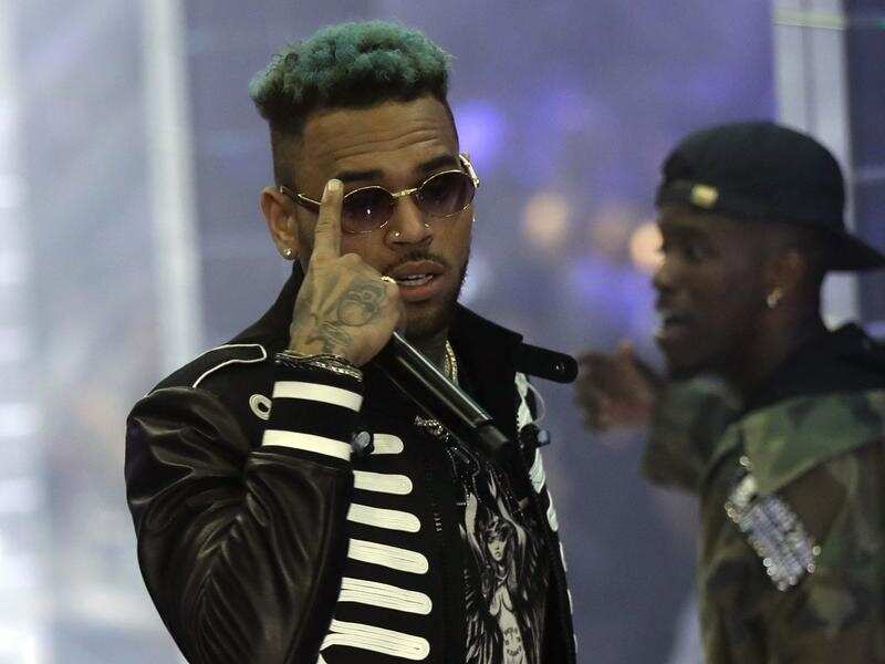 Singer Chris Brown has been arrested in France after a woman filed a rape complaint. 