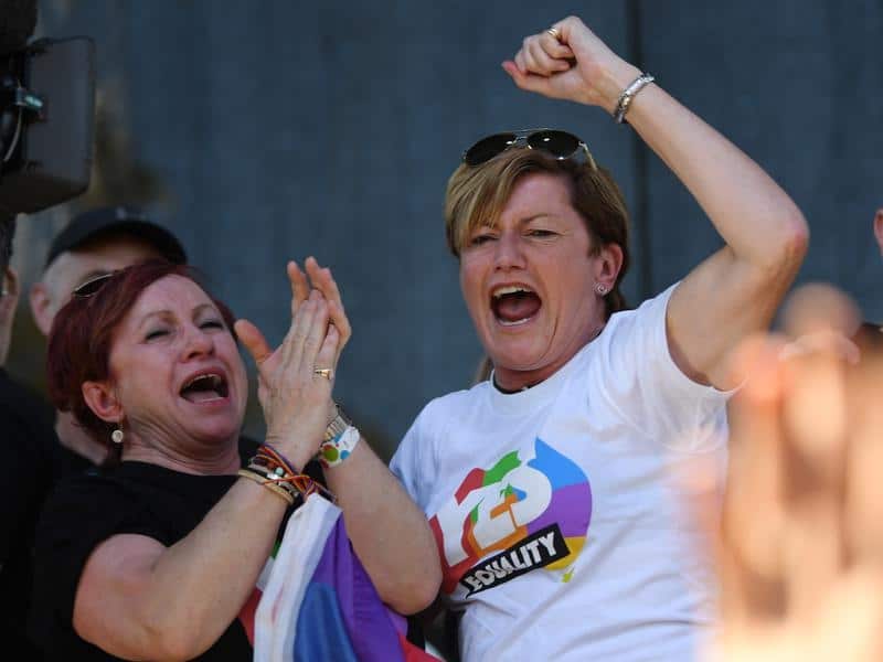 Christine Forster celebrates watching same sex marriage vote result.