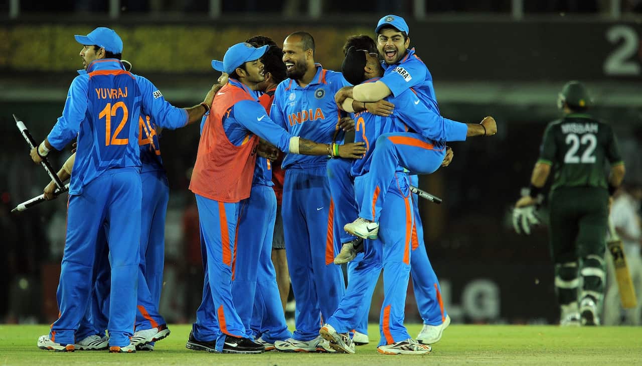Indian cricket team players celebrate after beating Pakistan during the ICC Cricket World Cup 2011 semi-final match. (Getty)
