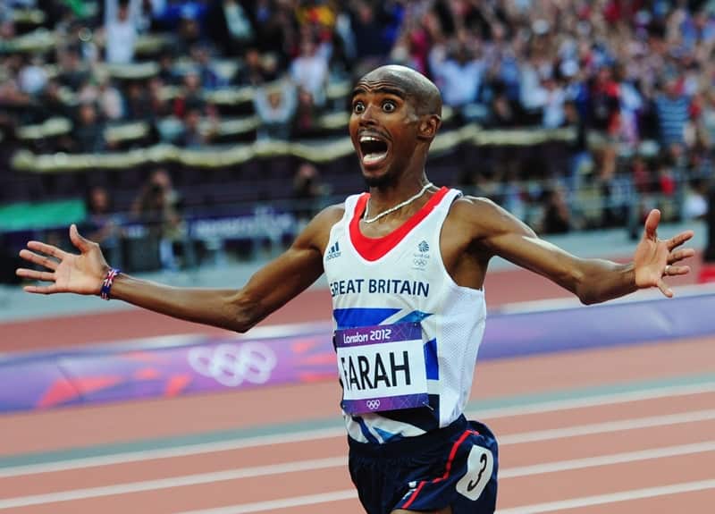 Mohamed Farah crosses the finish line to win gold in the Men's 5000m Final. 
